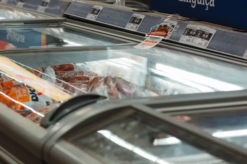 Glass lid commercial chest freezers stocked with frozen produce supplied by Fridges Direct North Wales