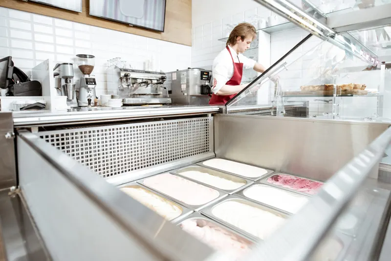 Frozen dessert being served from a freezer unit in a fast food outlet supplied by Fridges Direct